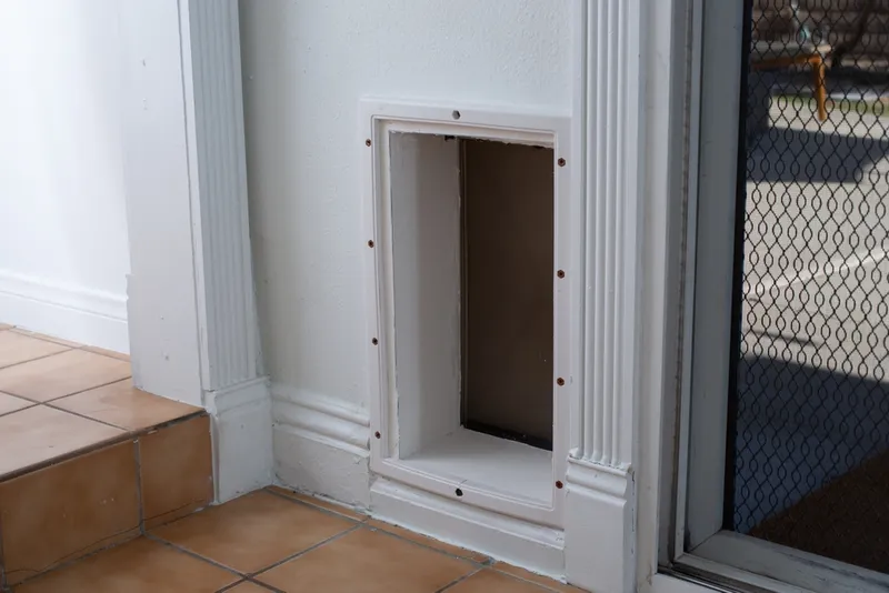 A view of a doggy door inside a home