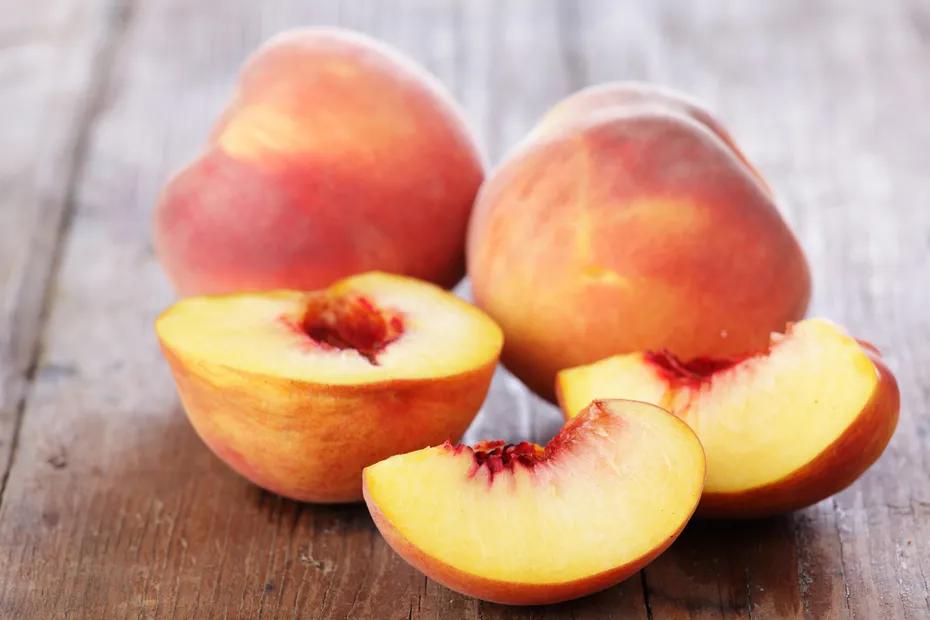 Peaches on a wooden table