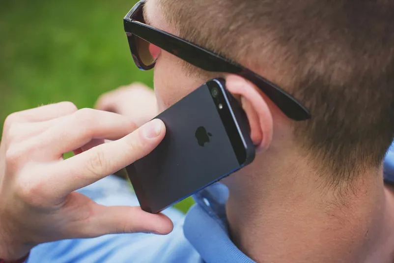 man talking to someone over the phone