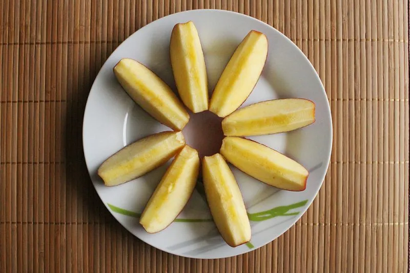 Apples sliced into a plate