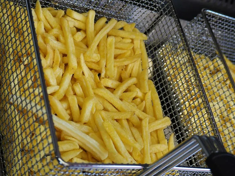 french fries in deep fryer
