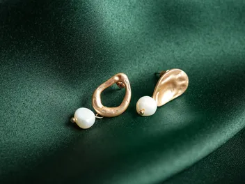 My Dog Ate an Earring: Potential Risks, Signs & Next Steps (Vet Answer)