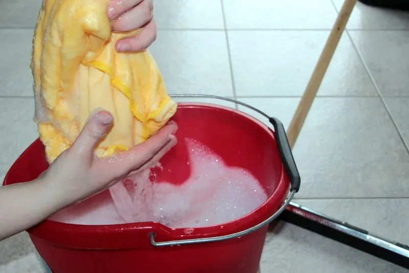 cleaning-bucket-with foam and rug