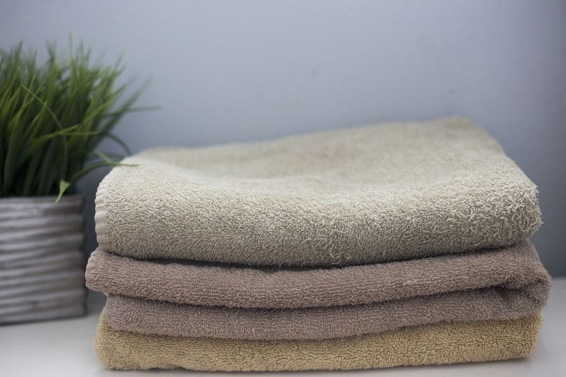 Towels stacked on table