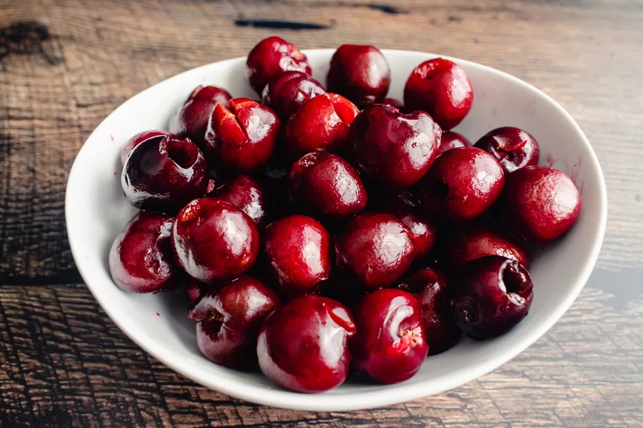 Freshly Pitted Cherries in a Small Bowl