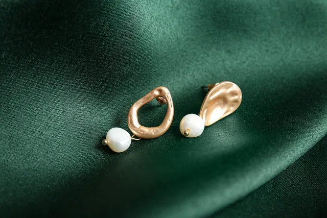 My Dog Ate an Earring: Potential Risks, Signs & Next Steps (Vet Answer)