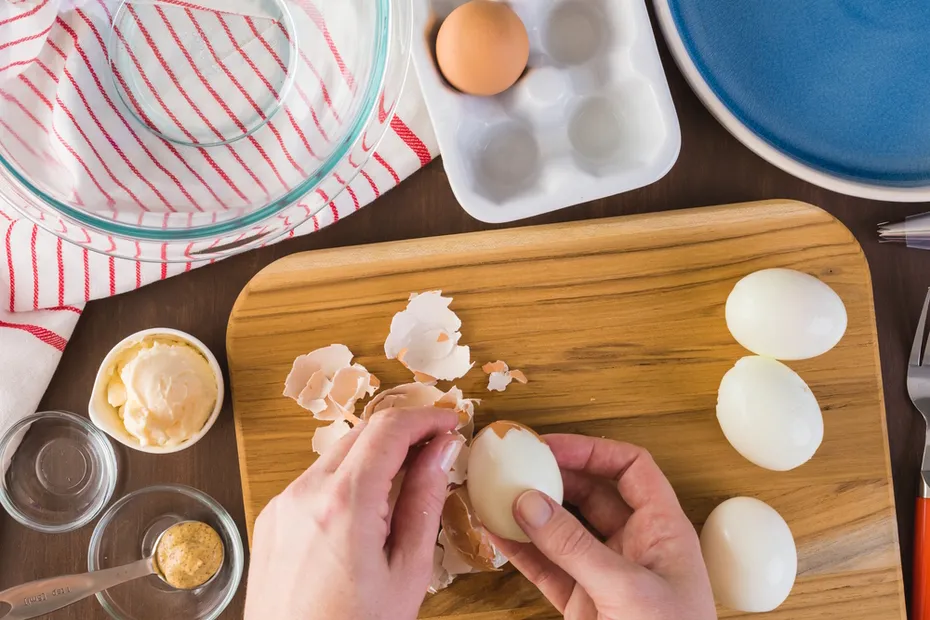 woman-preparing-deviled-eggs