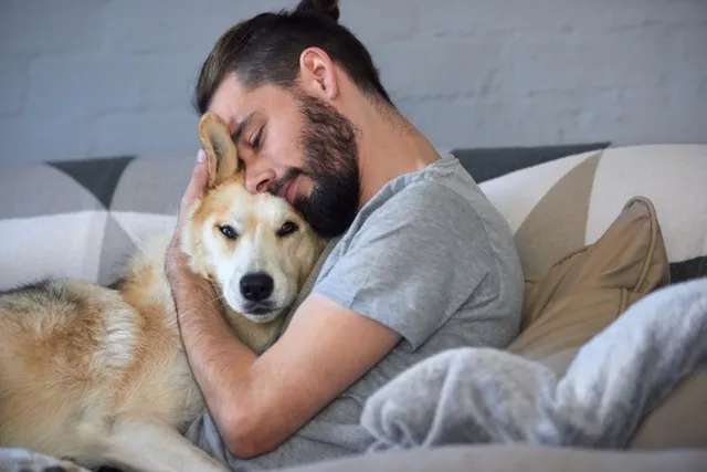 Why Do Dogs Like to Cuddle? 4 Reasons & Benefits