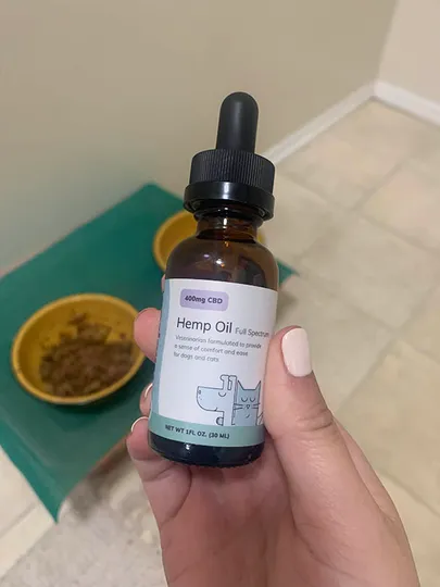 hand holding Anxious Pet Full Spectrum Hemp Oil