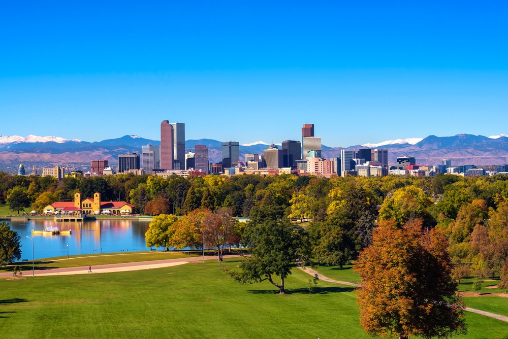 City skyline of Denver Colorado and the city park lake