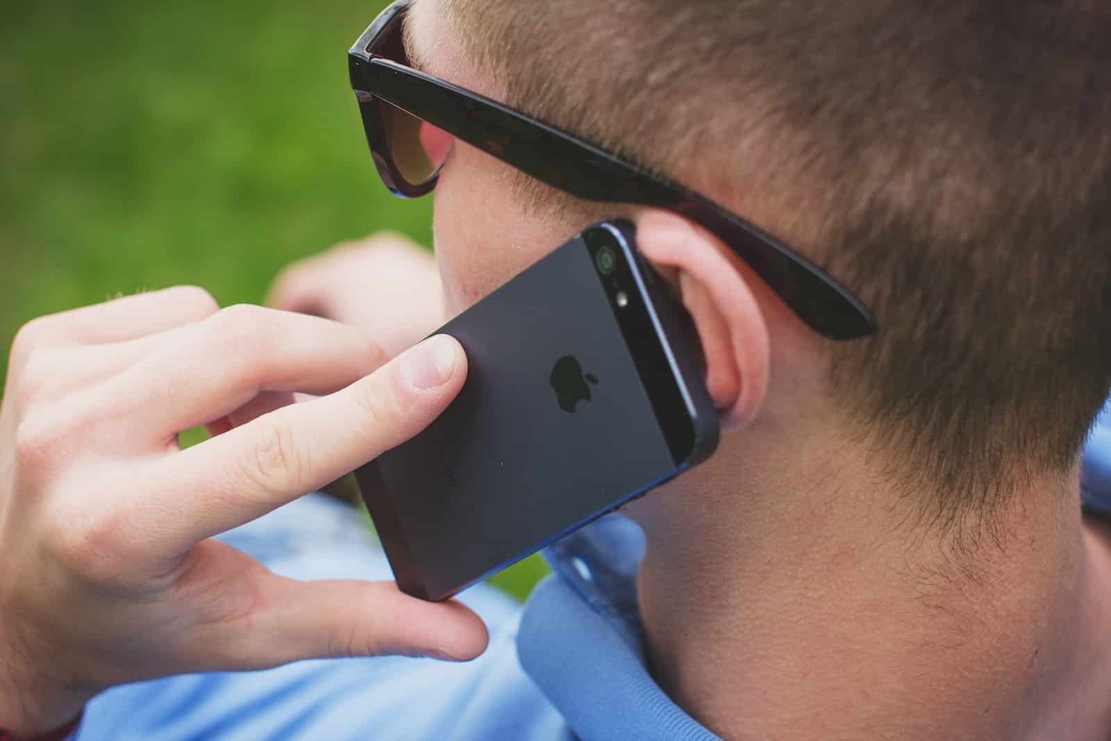man talking to someone over the phone