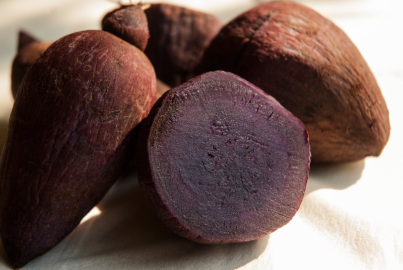 Purple yam on white background