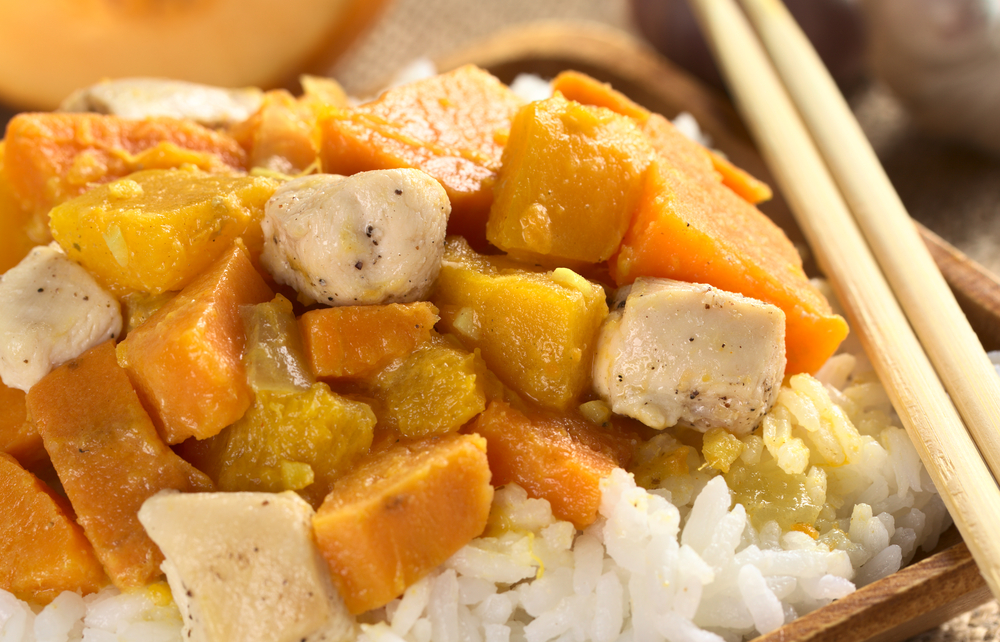 Boiled pumpkin and chicken on a bed of rice