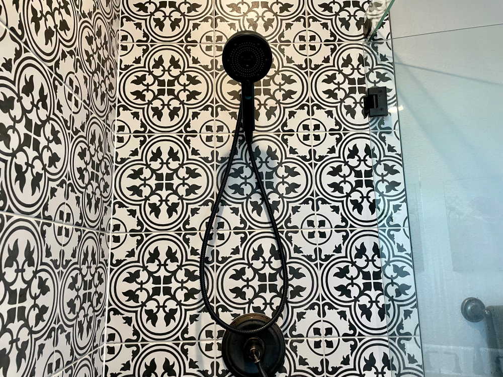 Brondell Nebia Merced Handheld Showerhead - product on the bathroom wall