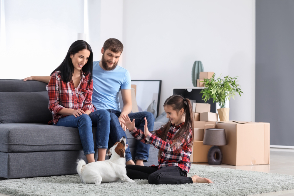 Happy-family-after-moving-into-new-house