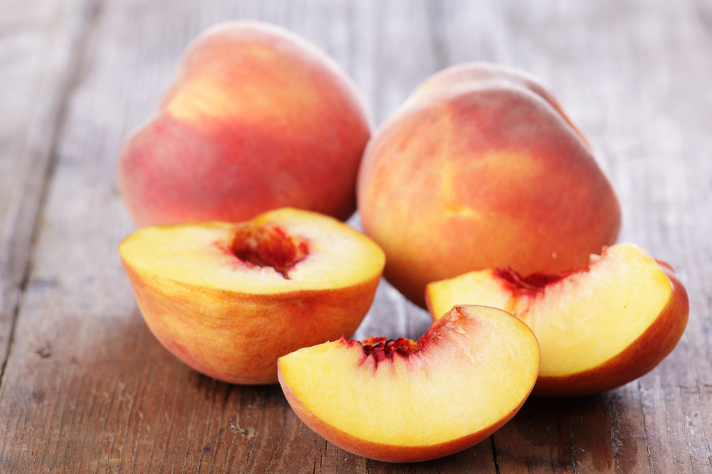 Peaches on a wooden table