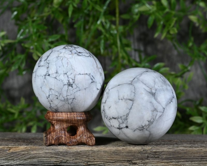 Two white Howlite polished spheres