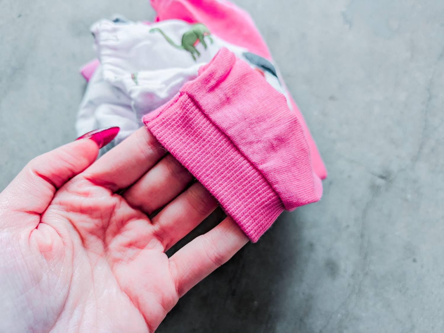 Leveret Dog Pink Dinosaur Pajamas Review - close up of cloth